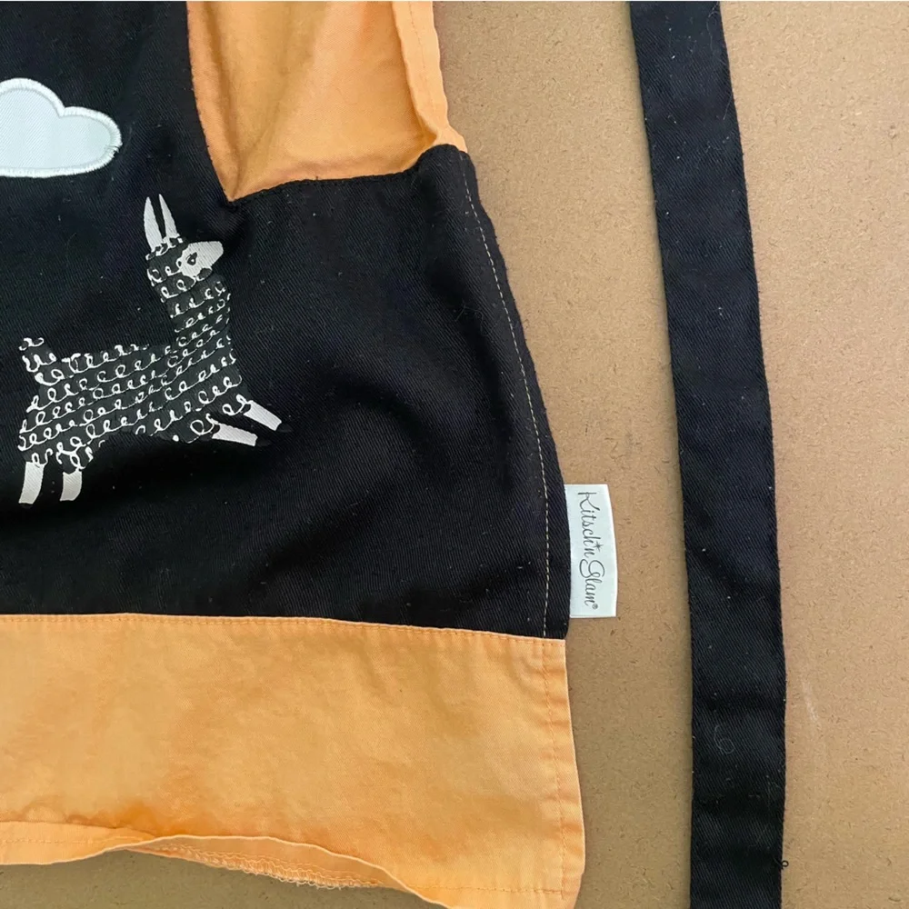 Kitsch’n Glam Black and Orange Machu Picchu Llama Apron with Pockets